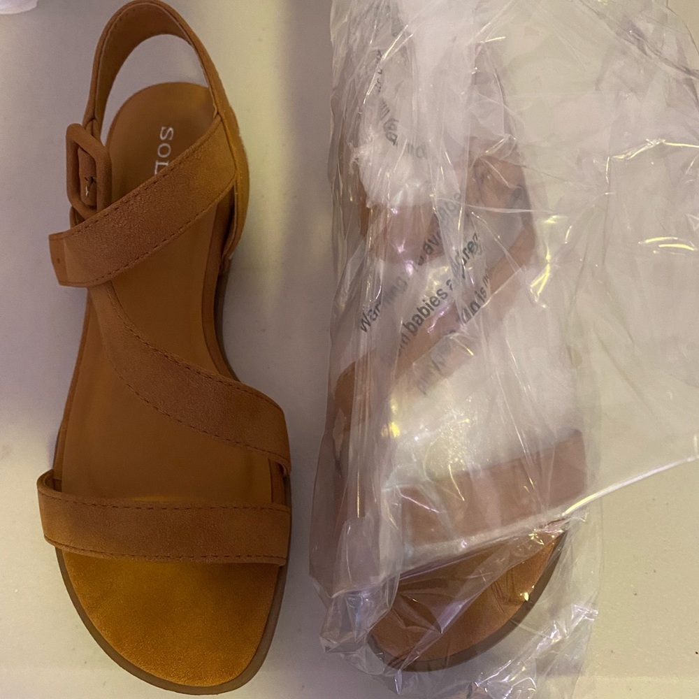 Brand new, never worn beige sandals